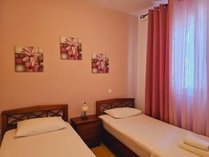Posteľ alebo postele v izbe v ubytovaní Corfu Glyfada Menigos Resort 59