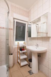Kúpeľňa v ubytovaní Apartments Green Garden + 37 fotografií