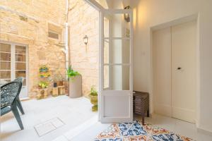 Voodi või voodid majutusasutuse 'Notabile' - Private Townhouse in Mdina toas