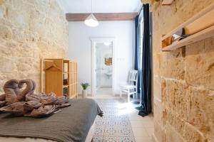Voodi või voodid majutusasutuse 'Notabile' - Private Townhouse in Mdina toas