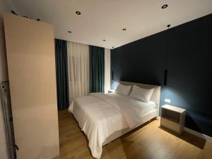 Postel nebo postele na pokoji v ubytování Central Modern Apartment