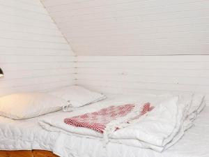 Postel nebo postele na pokoji v ubytování Holiday home Thyholm XV