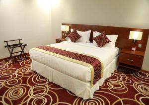 Postel nebo postele na pokoji v ubytování Wow Hotel Jeddah