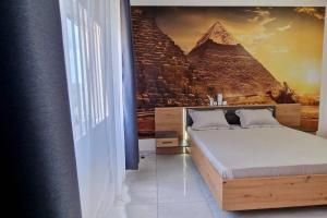 Postel nebo postele na pokoji v ubytování Pyramide