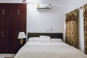 Ένα ή περισσότερα κρεβάτια σε δωμάτιο στο Stylish 2-bed Apartment Spintex