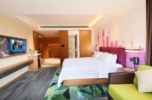 Postel nebo postele na pokoji v ubytování Hampton by Hilton Shanghai Hongqiao NECC + 32 fotografií