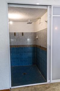 Ein Badezimmer in der Unterkunft Hotel Manava