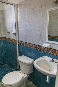 Ein Badezimmer in der Unterkunft Hotel Manava