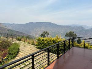 a balcony with a view of the mountains at Casa Felicia-Adding happy moments to your diary in Ooty