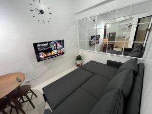 TV a/nebo společenská místnost v ubytování GM Transient Condo