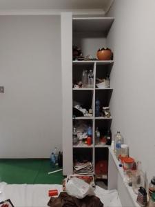 a room with a shelf with items on it at The Best African Traditional Healer and Love Spell sangoma in Polokwane in Polokwane