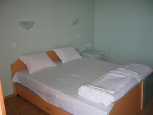 Postel nebo postele na pokoji v ubytování Complex Exotica