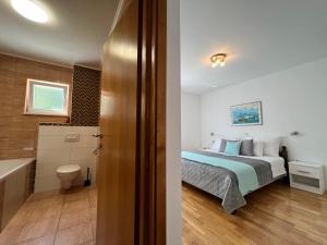 Postel nebo postele na pokoji v ubytování Villa Milina Korcula