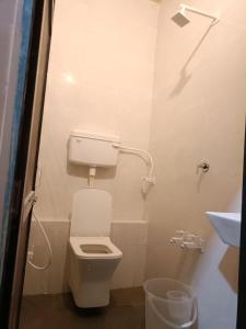 Salle de bains dans l'établissement krushna shakti holiday homes