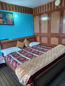 Ліжко або ліжка в номері Kaushal's Homestay