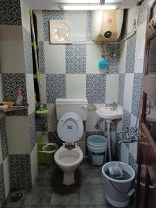 Ванна кімната в Kaushal's Homestay