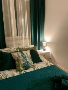 Posteľ alebo postele v izbe v ubytovaní Chillout Airport Apartment KL33 - air condition & free parking