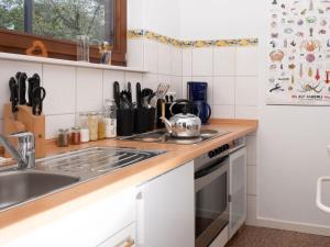 A kitchen or kitchenette at Mardorf 33 Comfortable holiday residence
