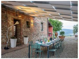 Restaurant ou autre lieu de restauration dans l'établissement Villa Botinaccio