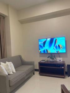 TV o dispositivi per l'intrattenimento presso The Mactan Suite at The Mactan Newtown Resort