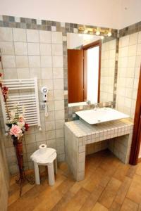 Ένα μπάνιο στο LUANA INN HOLIDAY