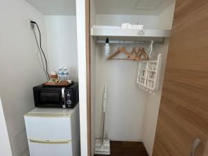 Eldhús eða eldhúskrókur á 湘南海岸 可见海景 江之岛旅游推荐住宿 独立房源 带卫生间、厨房 近海滩 海景房