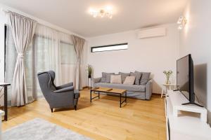 O zonă de relaxare la Romexpo Relax Spacious Apartment