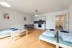 Nhà bếp/bếp nhỏ tại Muzeta Graz - Eco-Friendly Parkview Holiday Apartments in Graz’s Smart City +21 ảnh