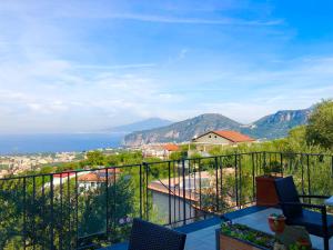 a balcony with a view of the mountains at Casa Mazzola in Sant'Agnello