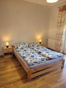 Posteľ alebo postele v izbe v ubytovaní Zielony Dom