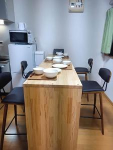 Eldhús eða eldhúskrókur á 京都站750米 交通便利 适合2-4位居住 独栋民居 京旅小築