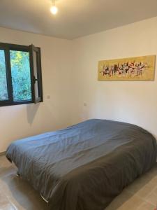 Postel nebo postele na pokoji v ubytování Villa 4 personnes - 2 chambres - Figari