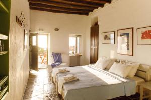 A bed or beds in a room at Alisideri Studios