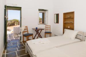 A bed or beds in a room at Alisideri Studios