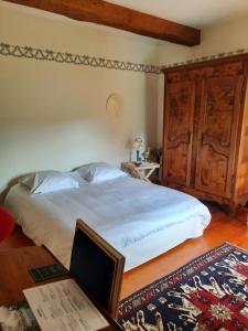 Posteľ alebo postele v izbe v ubytovaní Chambres d'hôtes Le Moulin Juste Ambierle - Loire