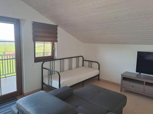 Postel nebo postele na pokoji v ubytování Apartman FARMA HRADEC
