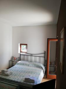 Cama o camas de una habitación en Soggiorni B&B Hermada