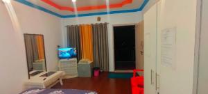 Postel nebo postele na pokoji v ubytování Snowdrop inn coorg