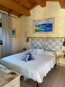 Postel nebo postele na pokoji v ubytování Casetta Vittoria
