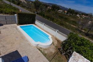 Bazén v ubytování INNOUTHOME Casa Familiar con Piscina y Jardín Av 3 Calas nebo v jeho okolí