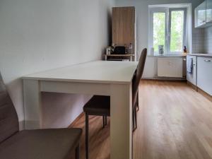 Kuchyň nebo kuchyňský kout v ubytování FEWO Jänschwalde II