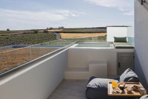 Balkón nebo terasa v ubytování Windmillside Luxury Villas