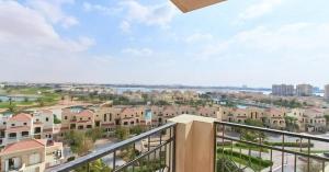 a balcony with a view of a city at Great lagoon view 1 bedroom Flat in Ras al Khaimah