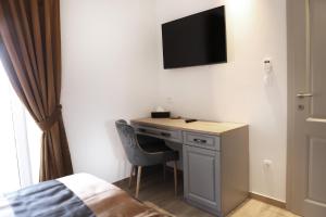 TV a/nebo společenská místnost v ubytování Vila Ulika