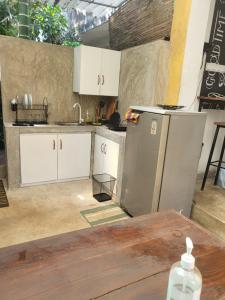 Kuchyň nebo kuchyňský kout v ubytování Hasthi homestay