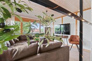 TV a/nebo společenská místnost v ubytování Industrial Loft am Pfaffenberg