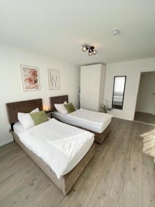 Un pat sau paturi într-o cameră la Stilvolles Apartment mit einzigartigem Charme
