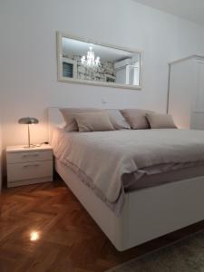 Posteľ alebo postele v izbe v ubytovaní Studios Ani