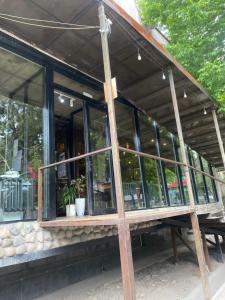 a building with windows on the side of it at Bulvar in Bishkek +9 photos