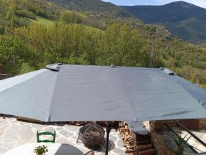 a tent is set up on top of a table at Espectacular Chalet de Montaña Pirineos, Burg in Burg